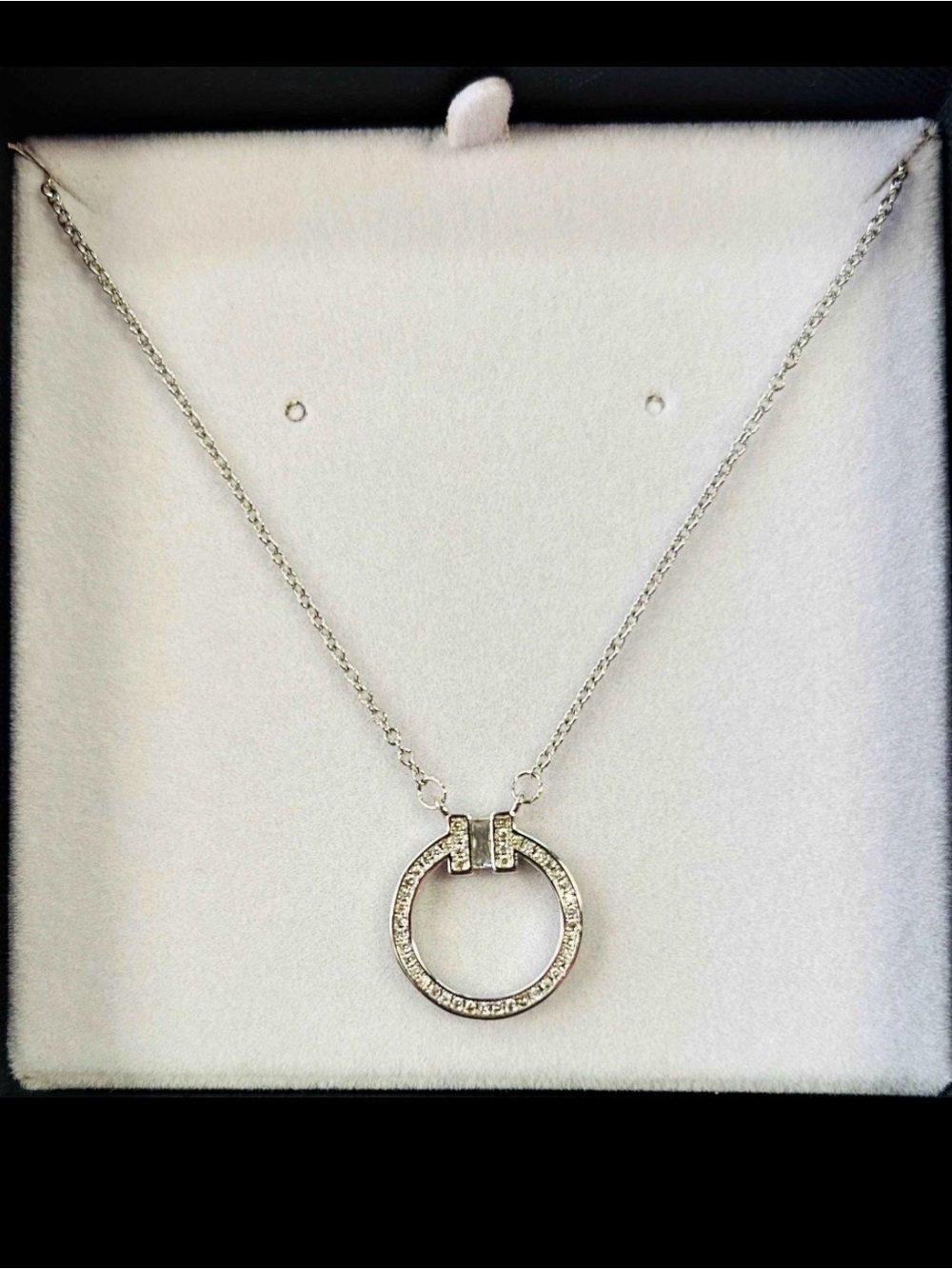 Tiffany T Diamond Pendant in white gold with a baguette Diamond